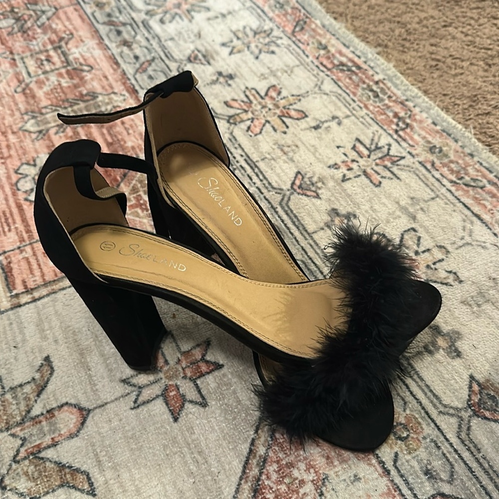 Black faux fur heels.